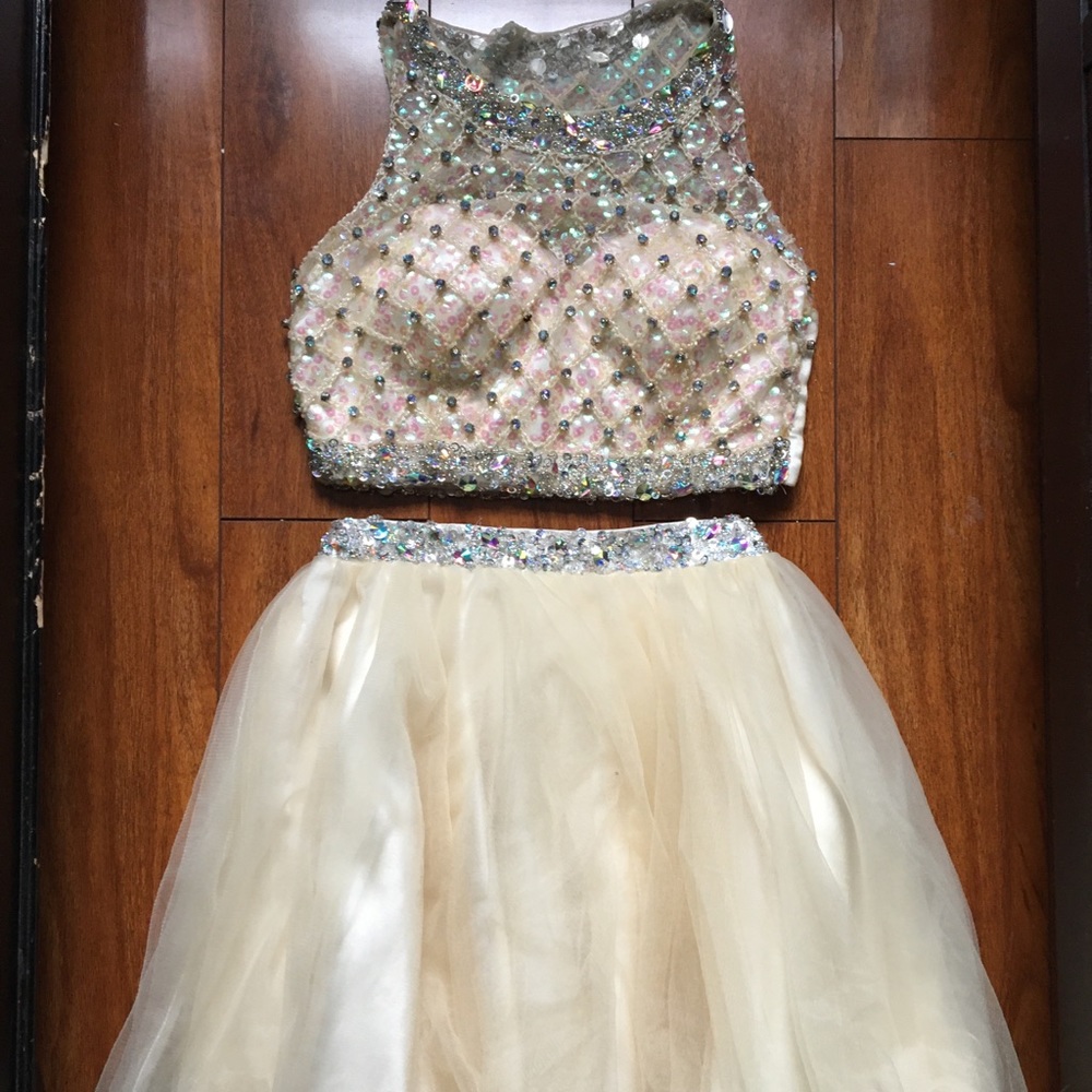 A champagne two-piece homecoming dress.